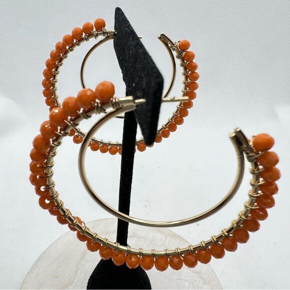 Orange beaded and gold tone double hoop post earrings - Picture 2 of 6